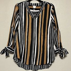 Long sleeve Chico’s top. Black and gold. Good condition.